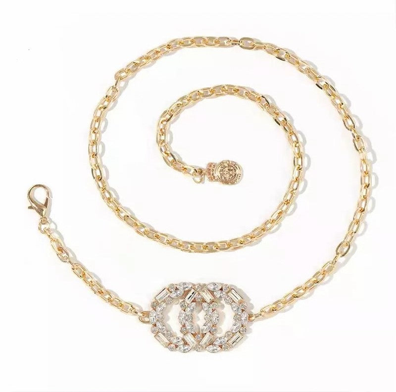 Dames Sieraden Geschenkset Novah met Halsketting Armband Parel Taille Riem en Skeleton Horloge