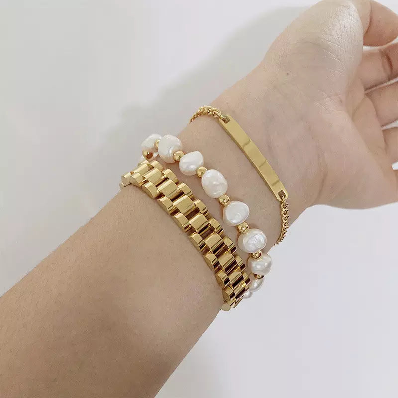 Dames Armband Goud en Zilverkleurig Stainless Steel Met Grove Schakels 18 Cm Maryn